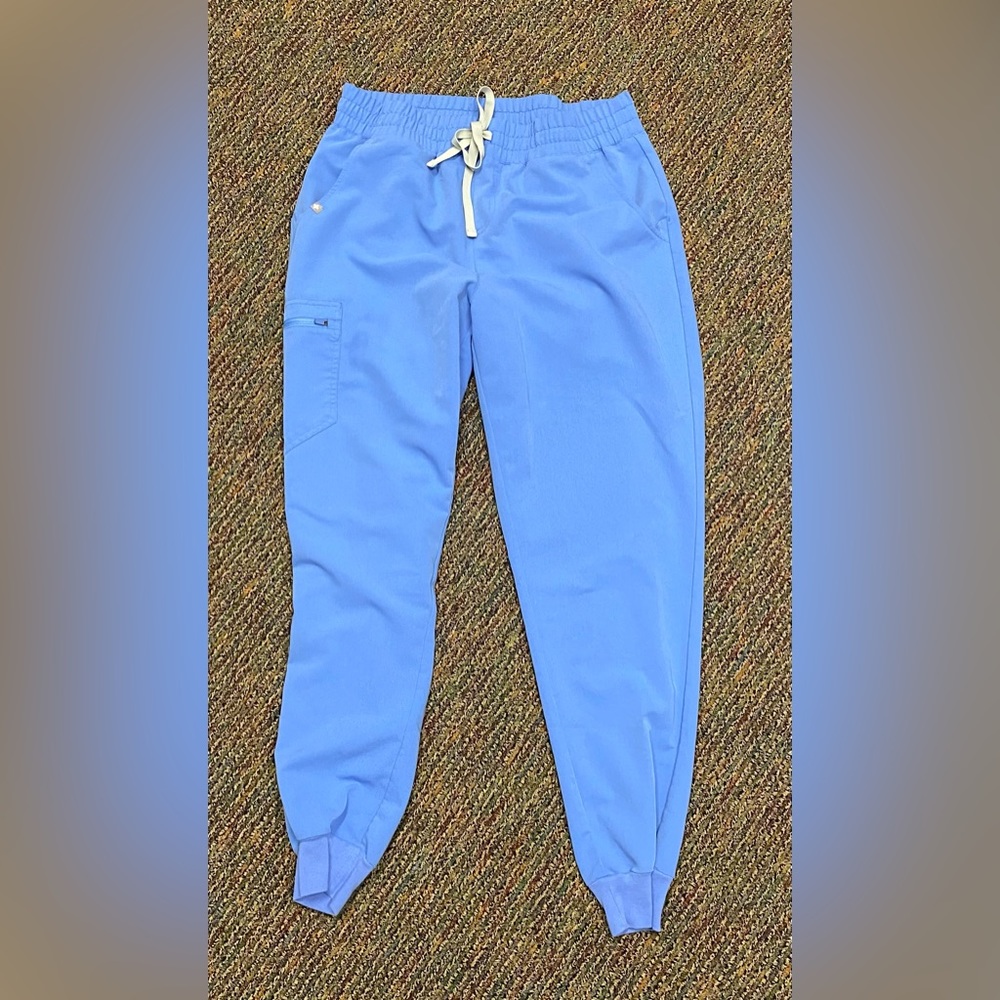 Figs scrubs in great condition. They are too big for me now. Large Tall size